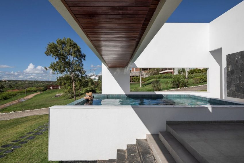 NEBR Arquitetura Designs a Stylish Contemporary House Set Amidst the Scenic Rocky Lands of Gravatá, Brazil (7)