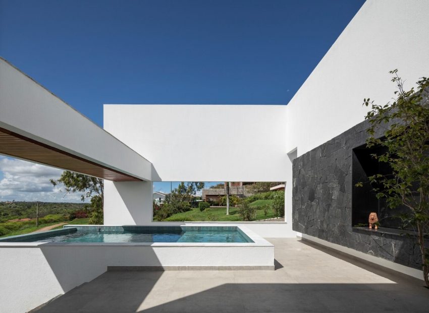 NEBR Arquitetura Designs a Stylish Contemporary House Set Amidst the Scenic Rocky Lands of Gravatá, Brazil (8)