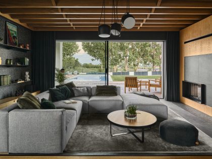 Zarysy Designs a Charming Mid-Century Lakeside Home in Sroda Wielkopolska, Poland (1)