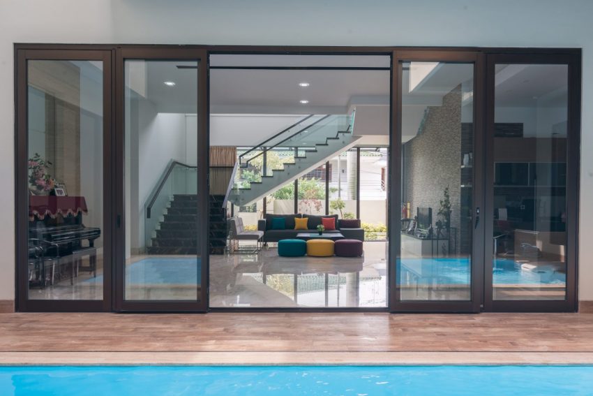 A Contemporary Home Embraces an Open Courtyard and Pool in Jakarta, Indonesia by EVONIL Architecture (3)