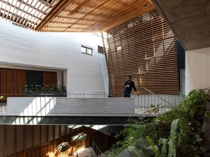 A Modern Home Balances Brick, Concrete, Wood and Metal Elements in Quito, Ecuador by Diez + Muller Arquitectos (11)