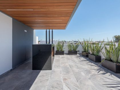 A Modern Home Features Stone, Wood, Glass and Steel in Aguascalientes, Mexico by Luis Magdaleno Veloz (22)