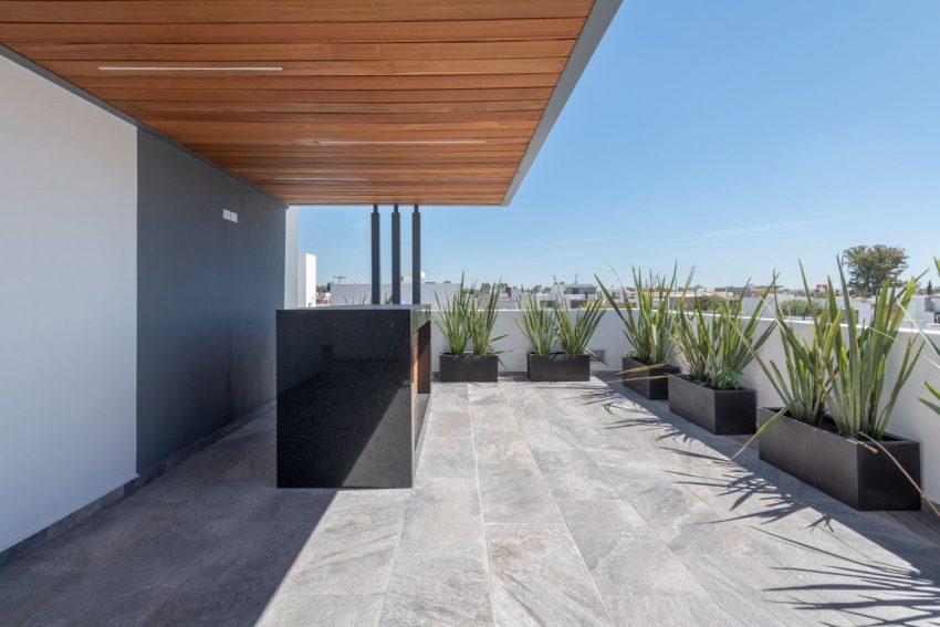 A Modern Home Features Stone, Wood, Glass and Steel in Aguascalientes, Mexico by Luis Magdaleno Veloz (22)