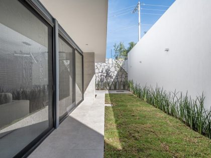 A Modern Home Features Stone, Wood, Glass and Steel in Aguascalientes, Mexico by Luis Magdaleno Veloz (26)