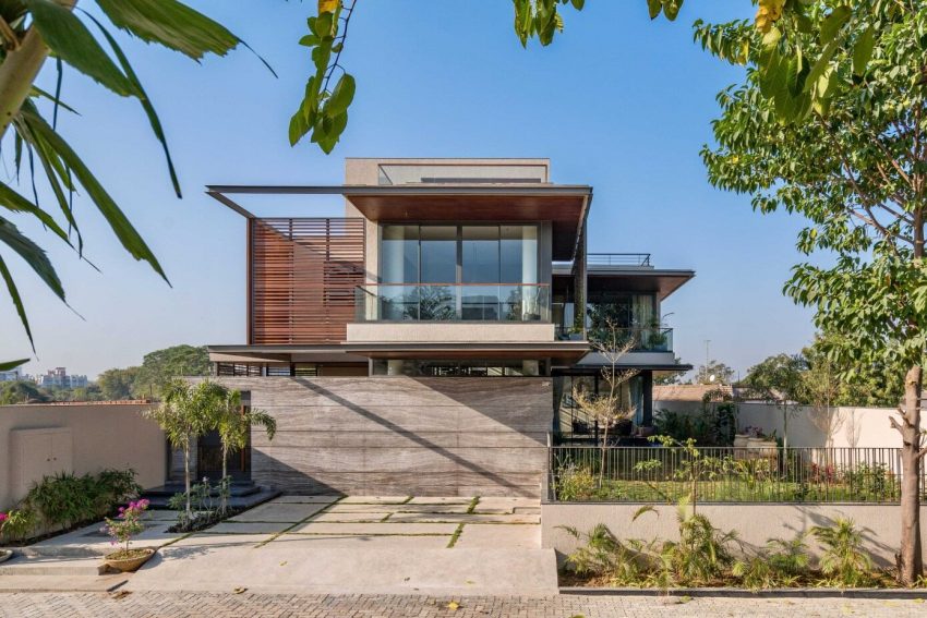 A Modern Three-Story Concrete House with a Stunning Staircase in Ahmedabad, India by Inclined Studio (1)