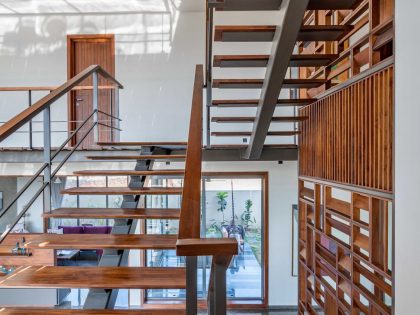 A Modern Three-Story Concrete House with a Stunning Staircase in Ahmedabad, India by Inclined Studio (13)