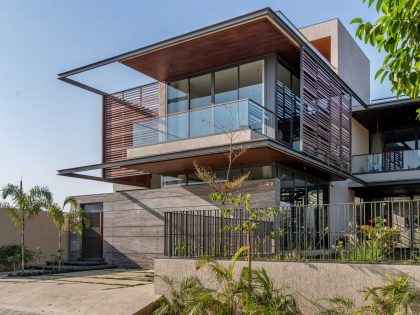 A Modern Three-Story Concrete House with a Stunning Staircase in Ahmedabad, India by Inclined Studio (2)