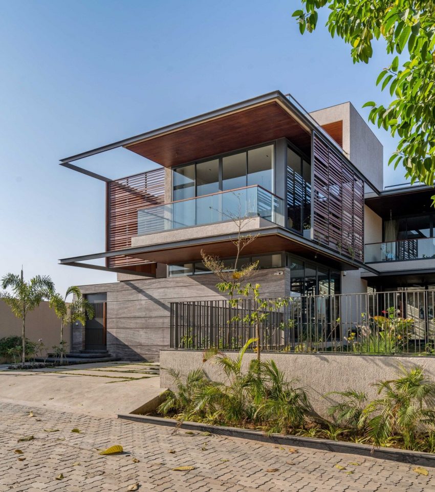 A Modern Three-Story Concrete House with a Stunning Staircase in Ahmedabad, India by Inclined Studio (2)