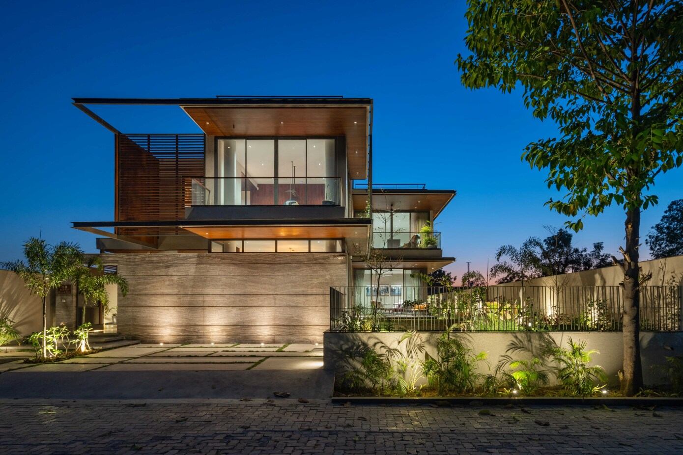 A Modern Three-Story Concrete House with a Stunning Staircase in Ahmedabad, India by Inclined Studio (25)