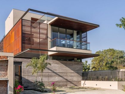 A Modern Three-Story Concrete House with a Stunning Staircase in Ahmedabad, India by Inclined Studio (3)