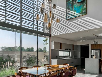 A Modern Three-Story Concrete House with a Stunning Staircase in Ahmedabad, India by Inclined Studio (5)