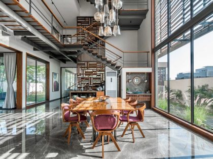 A Modern Three-Story Concrete House with a Stunning Staircase in Ahmedabad, India by Inclined Studio (7)