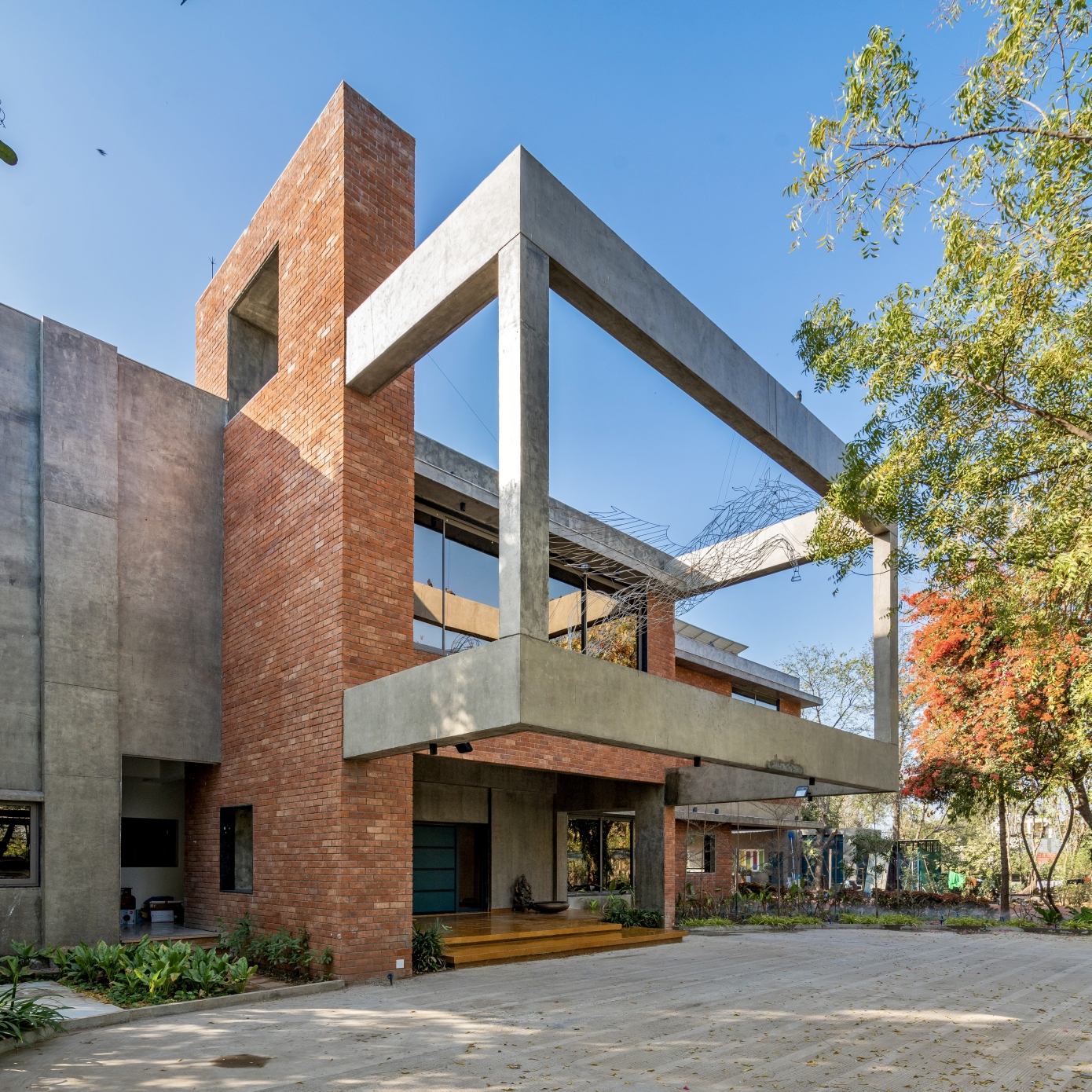 A Spacious Modern Brick Home with a Bright and Elegant Interior in Ahmedabad, India by Vihar Fadia Architects (1)
