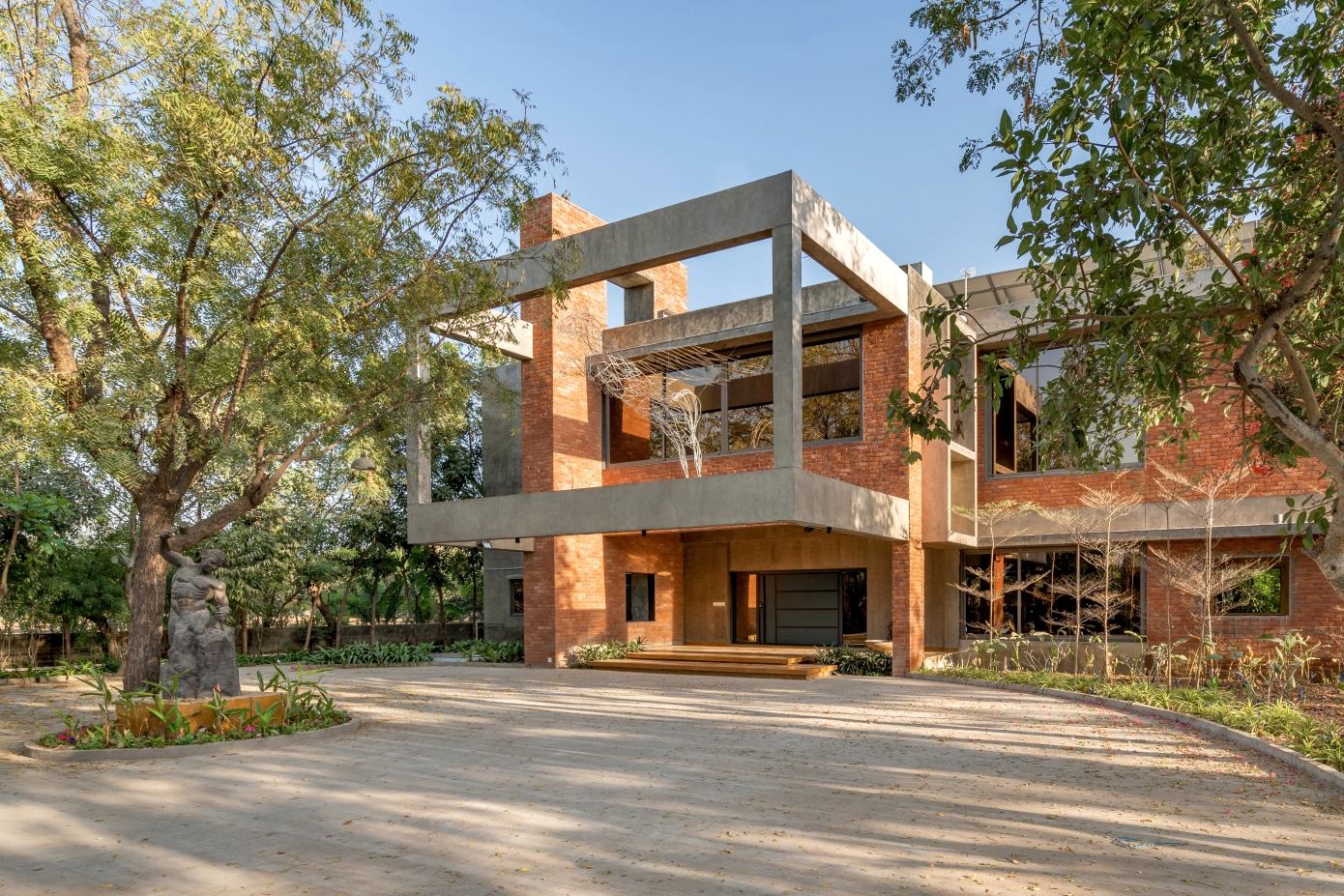 A Spacious Modern Brick Home with a Bright and Elegant Interior in Ahmedabad, India by Vihar Fadia Architects (2)