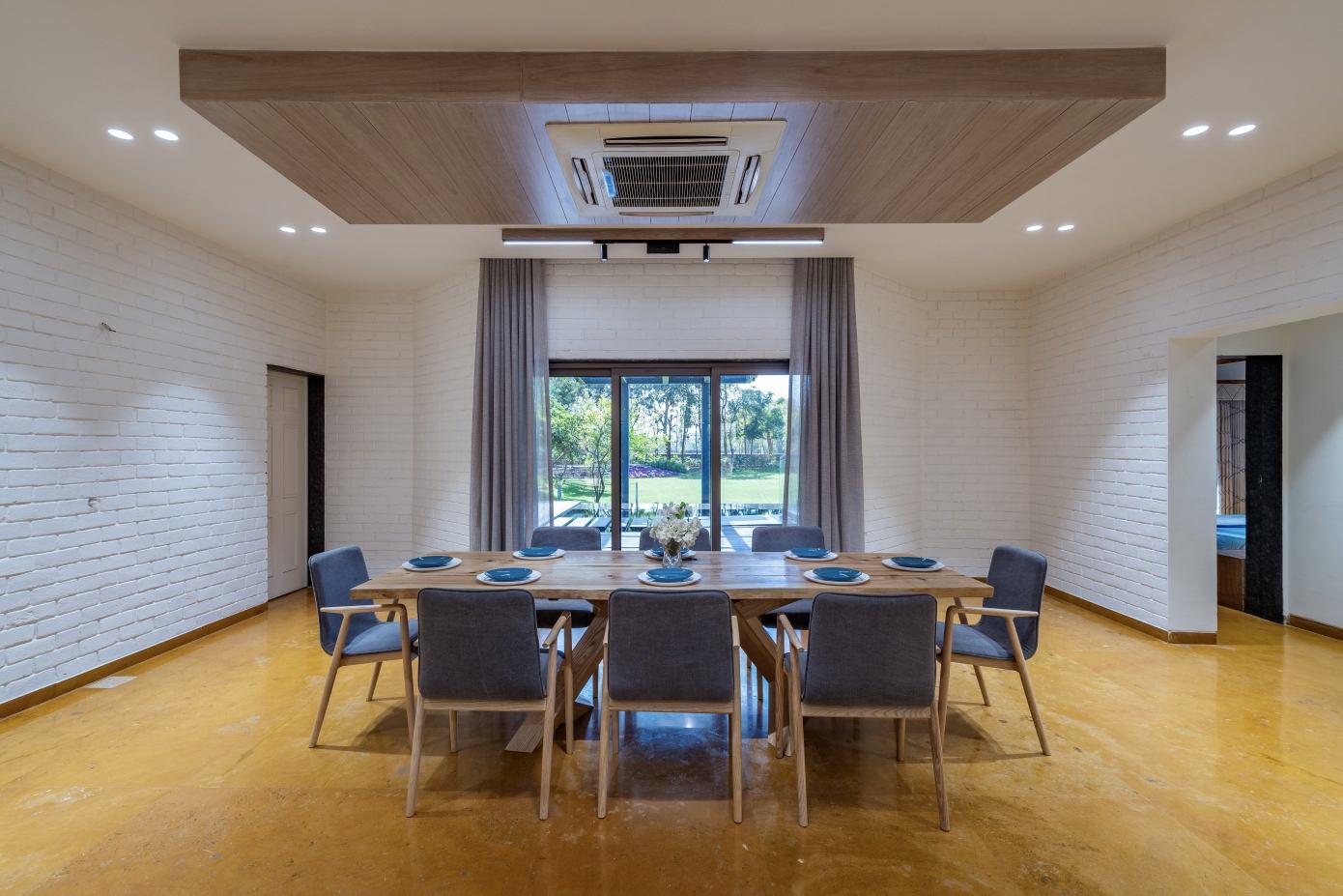 A Spacious Modern Brick Home with a Bright and Elegant Interior in Ahmedabad, India by Vihar Fadia Architects (9)