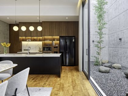 A Stunning Concrete Home for a Couple and Two Children in Semarang, Indonesia by Tamara Wibowo Architects (10)