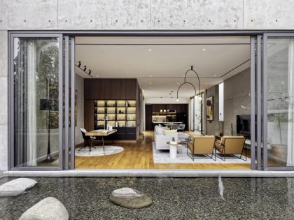 A Stunning Concrete Home for a Couple and Two Children in Semarang, Indonesia by Tamara Wibowo Architects (11)