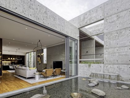 A Stunning Concrete Home for a Couple and Two Children in Semarang, Indonesia by Tamara Wibowo Architects (12)