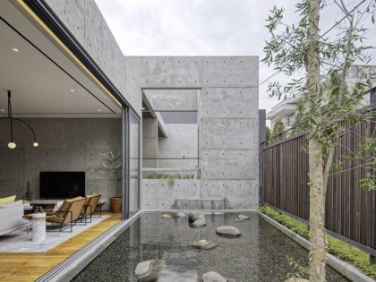 A Stunning Concrete Home for a Couple and Two Children in Semarang, Indonesia by Tamara Wibowo Architects (13)