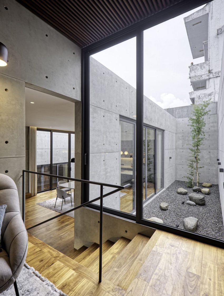 A Stunning Concrete Home for a Couple and Two Children in Semarang, Indonesia by Tamara Wibowo Architects (15)