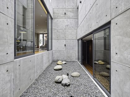 A Stunning Concrete Home for a Couple and Two Children in Semarang, Indonesia by Tamara Wibowo Architects (22)