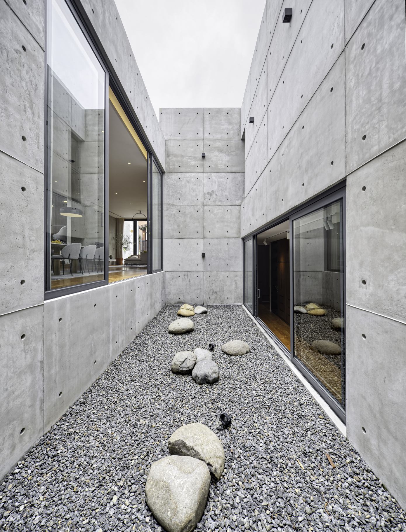 A Stunning Concrete Home for a Couple and Two Children in Semarang, Indonesia by Tamara Wibowo Architects (22)