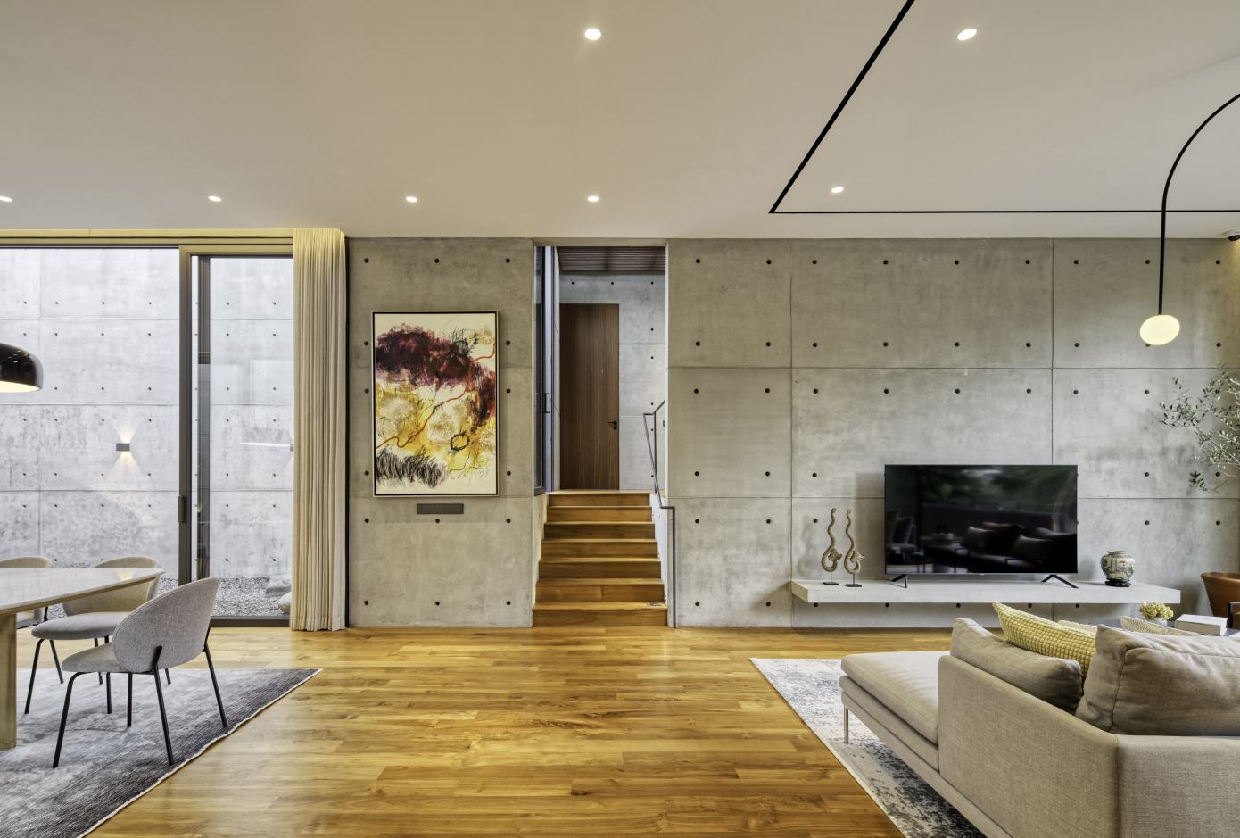 A Stunning Concrete Home for a Couple and Two Children in Semarang, Indonesia by Tamara Wibowo Architects (5)