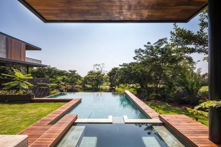 A Stunning and Luxurious Concrete House Framed by a Vast Vegetation of Colima, Mexico by Di Frenna Arquitectos (8)