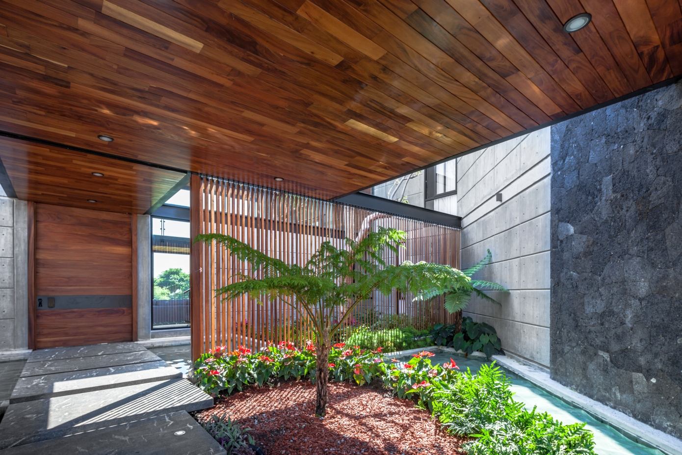 A Stunning and Luxurious Concrete House Framed by a Vast Vegetation of Colima, Mexico by Di Frenna Arquitectos (9)
