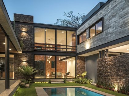 An Elegant Concrete and Steel Home with Stone and Wood Elements in Colima, Mexico by Di Frenna Arquitectos (20)