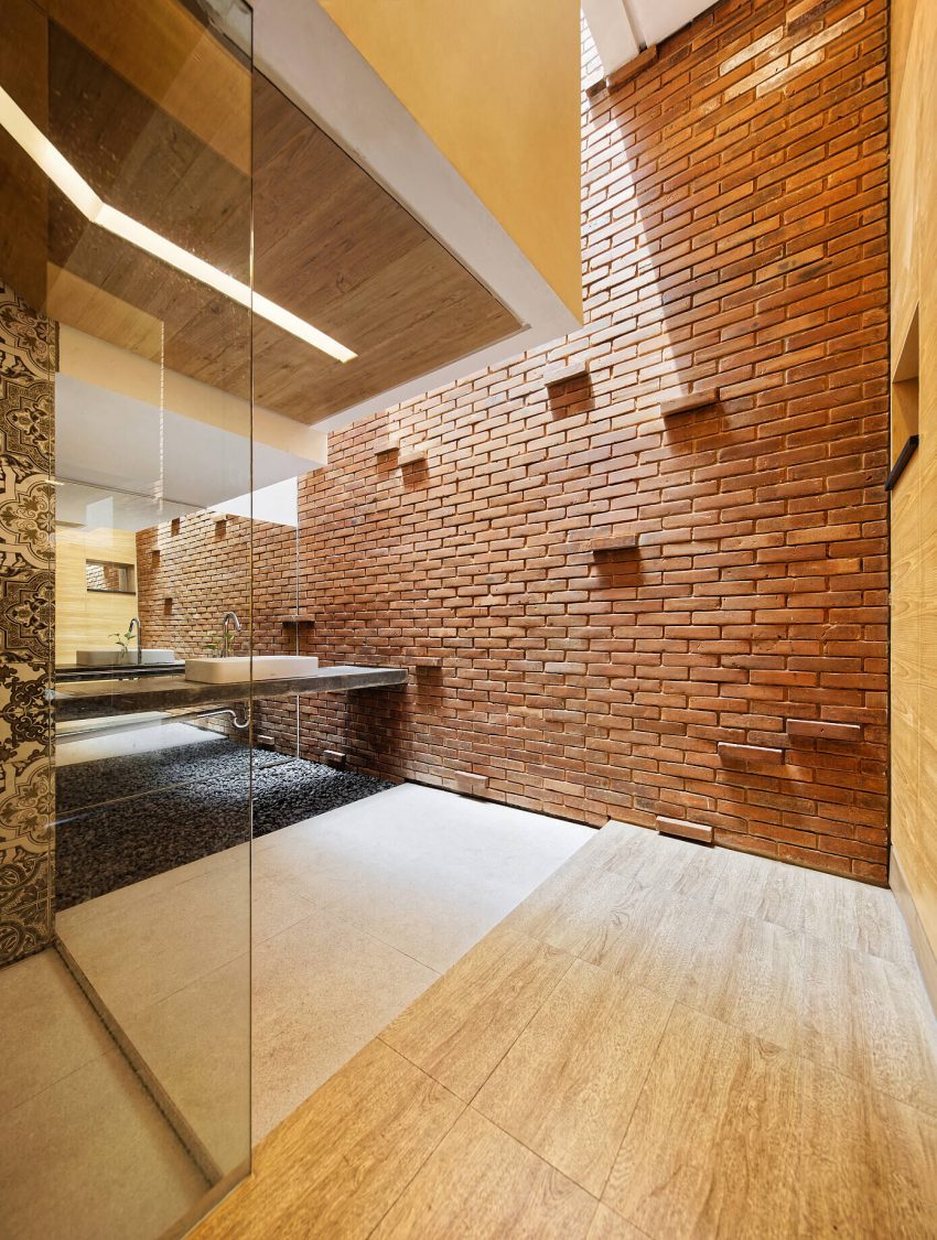 An Elegant House with Contemporary Brick Facade in Depok City, Indonesia by Delution (14)