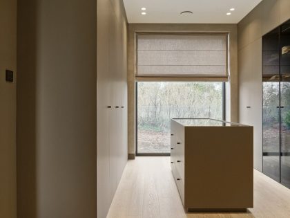 EV Architects Designs a Striking Minimalist Apartment in Poznań, Poland (12)