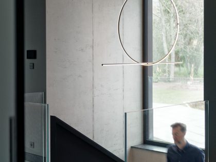 EV Architects Designs a Striking Minimalist Apartment in Poznań, Poland (7)