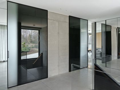 EV Architects Designs a Striking Minimalist Apartment in Poznań, Poland (8)